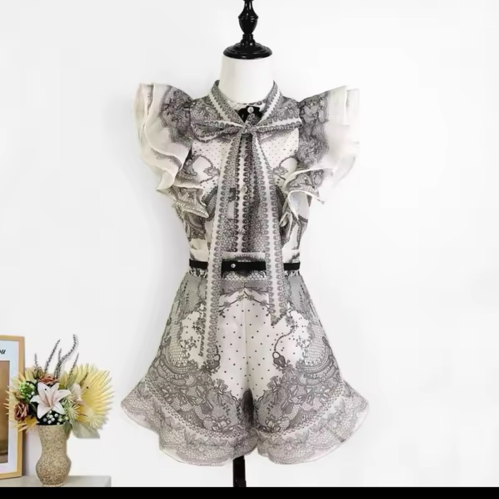 Elegant Black and White Lace Blouse and Shorts - Picture 5 of 7